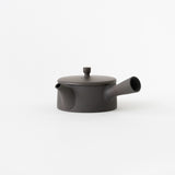 <transcy>Black Cylindrical Teapot</transcy>