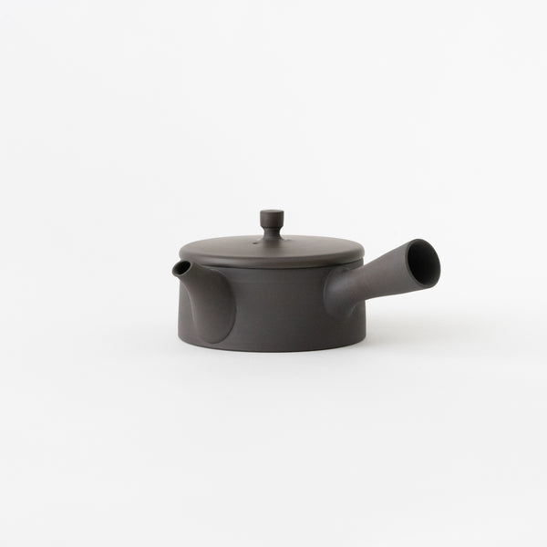 <transcy>Black Cylindrical Teapot</transcy>